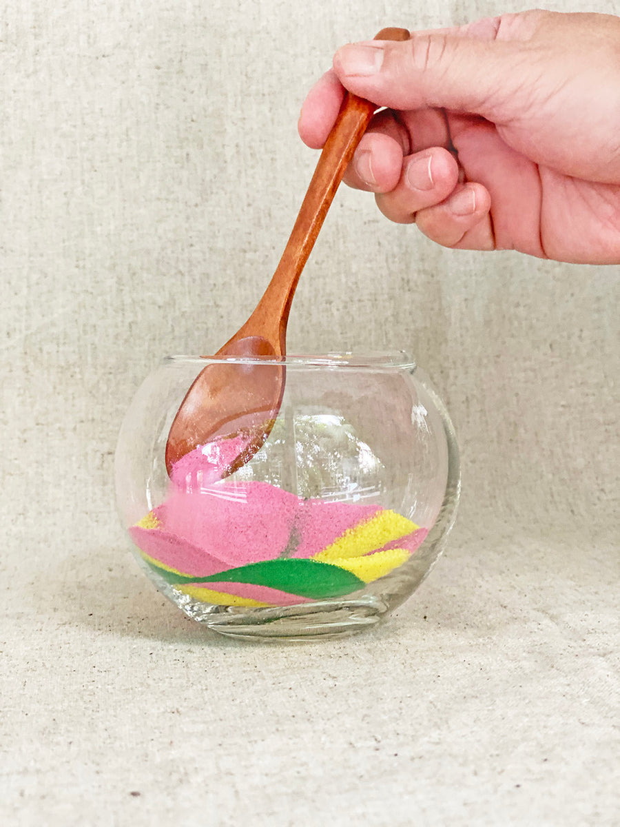 Use any spoon to create sand art